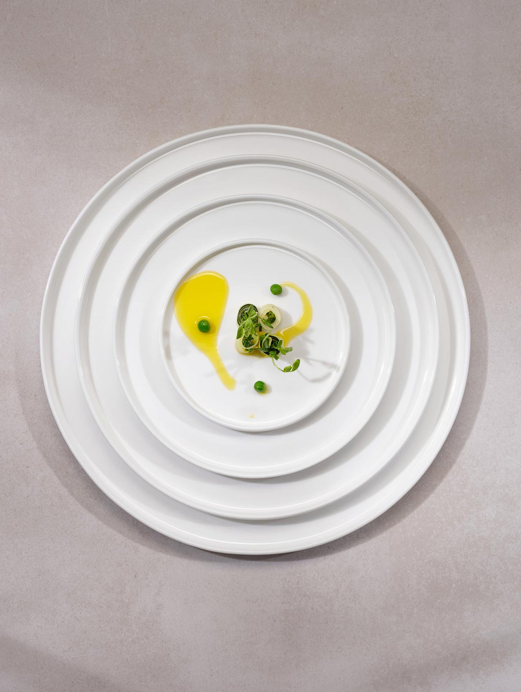 VI Oco-Tellerstapel-topview_f143b055-aa8b-4a25-a7b6-c6c4a47c8674.jpg